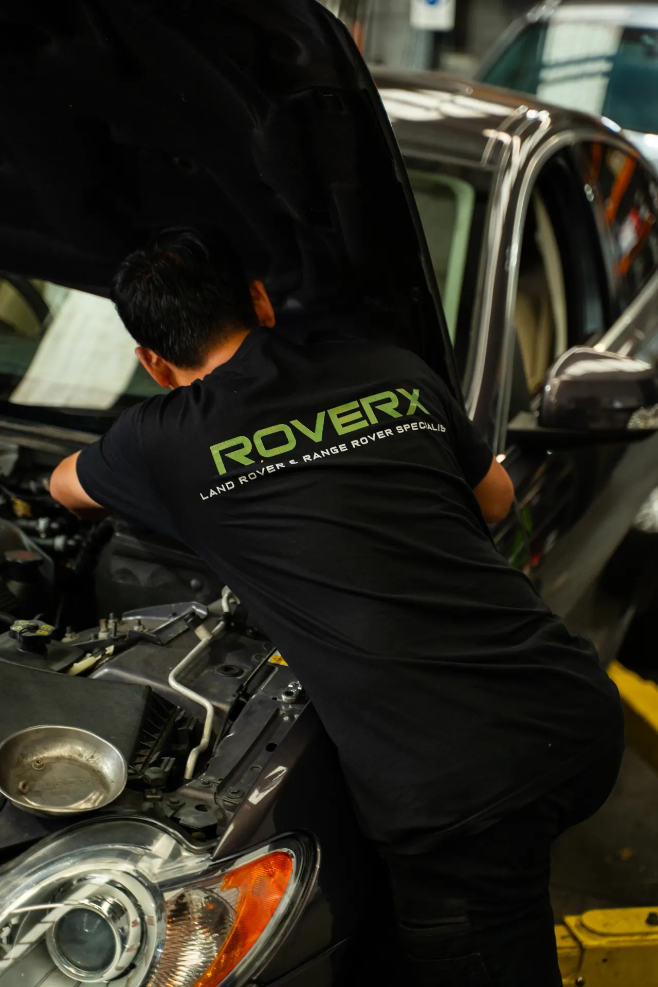 Paul Cruz working on a Jaguar at RoverX